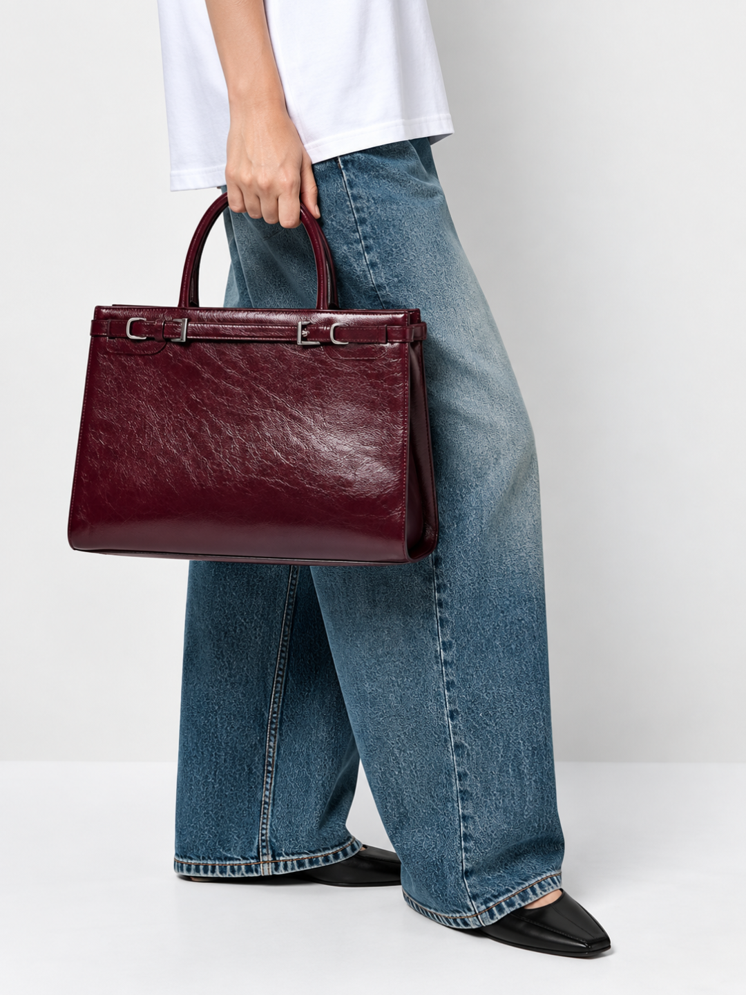 Structured burgundy handbag
